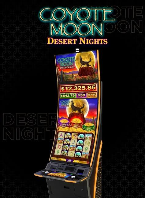 Coyote Moon Desert Nights promotional artwork featuring the game cabinet and desert moon branding